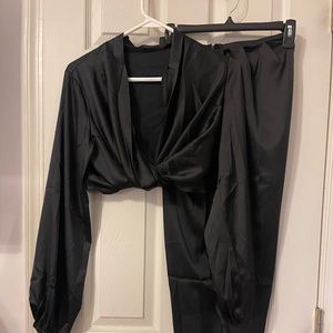 Black silky skirt and top.